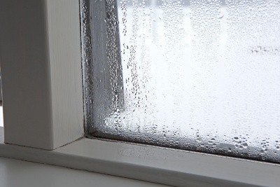 How does double glazing reduce condensation