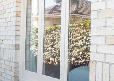 Casement windows double glazed. Timber beads are hard to distinguish, flush with face of sash