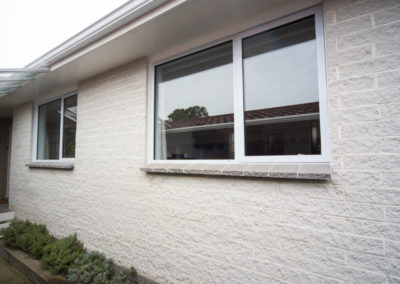 Replacement windows into 1970s brick clad home