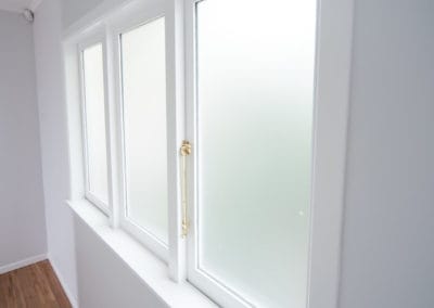 Timber retrofit double glazing, glass for window chosen to provide increased privacy